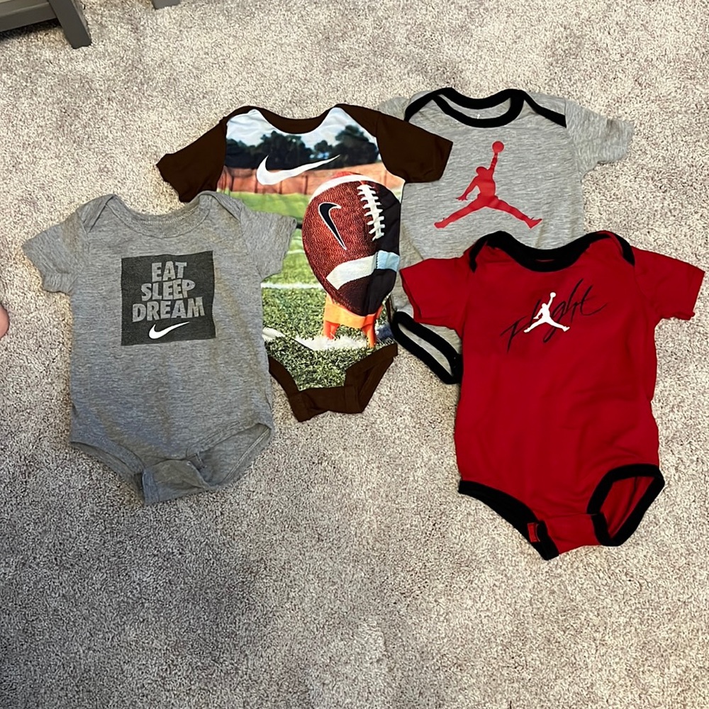 3/$20 NIKE and JORDAN onesies size 9/12 months
